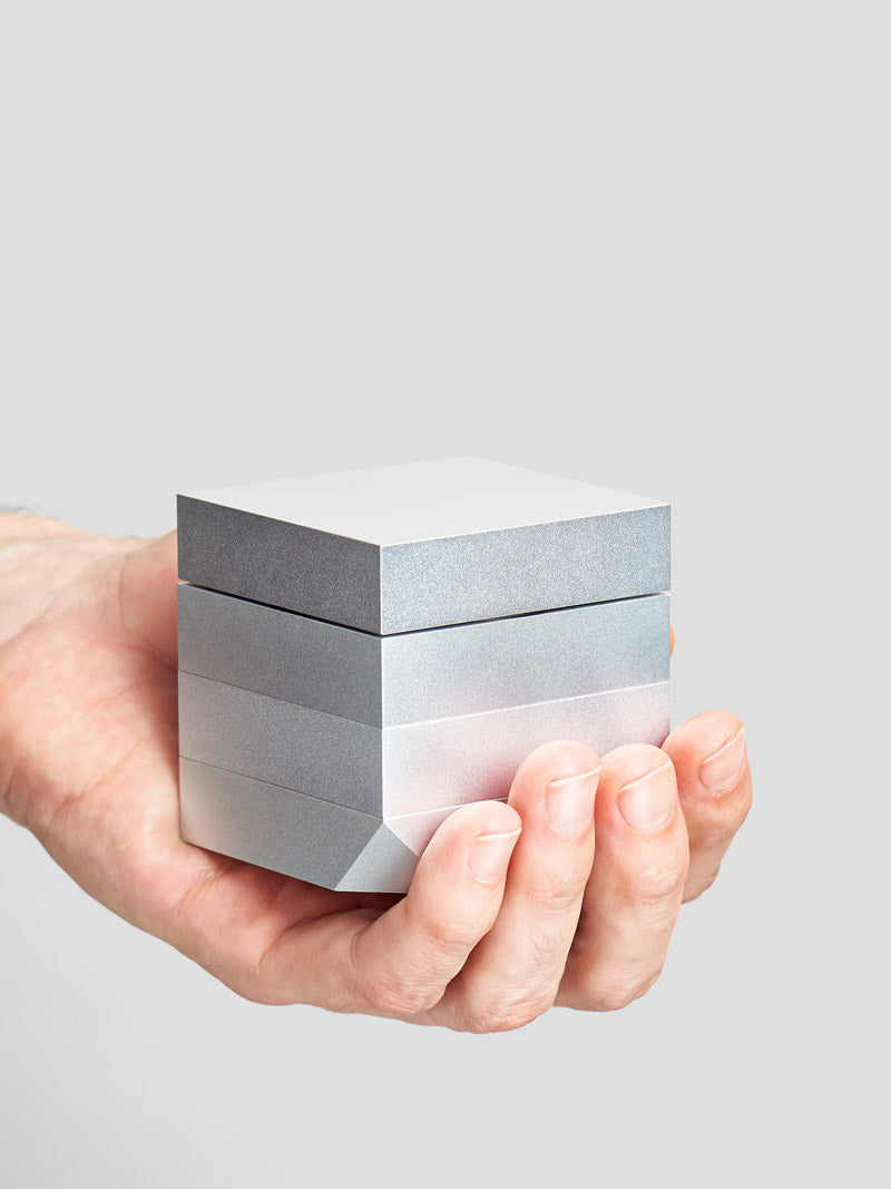 Cube Grinder by Laundry Day - held by a hand
