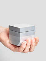 Cube Grinder by Laundry Day - held by a hand